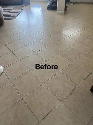 Tile floor with visible soil before cleaning